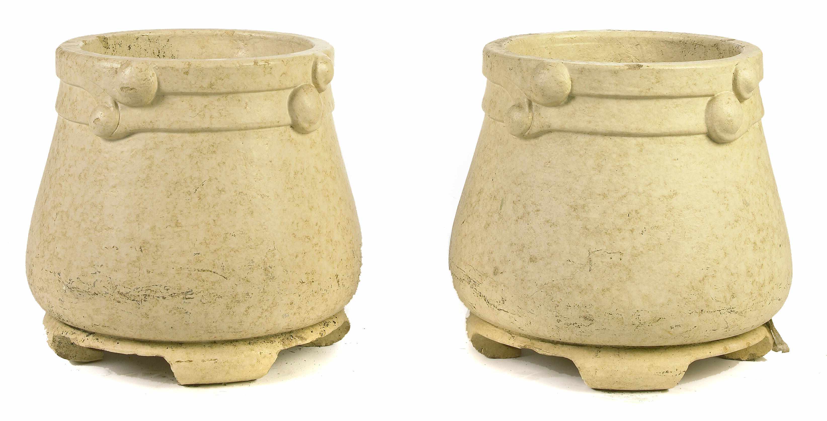 Appraisal: A pair of glazed composition pots height in diameter in