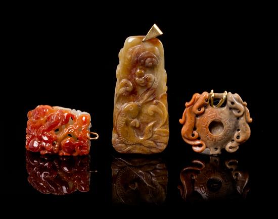 Appraisal: Sale Lot A Group of Three Carved Hardstone Pendants the