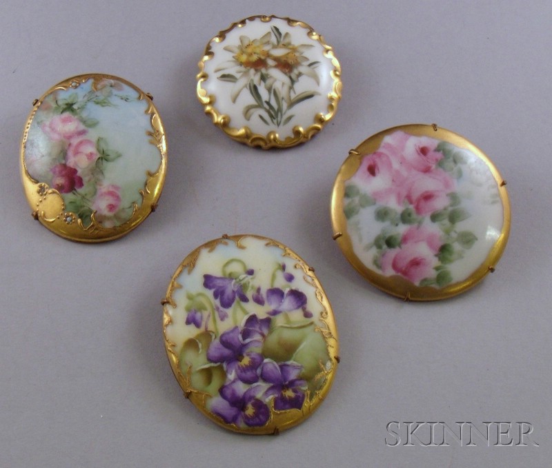 Appraisal: Four Hand-Painted and Gilt-Decorated Porcelain Pins Rosenthal and others