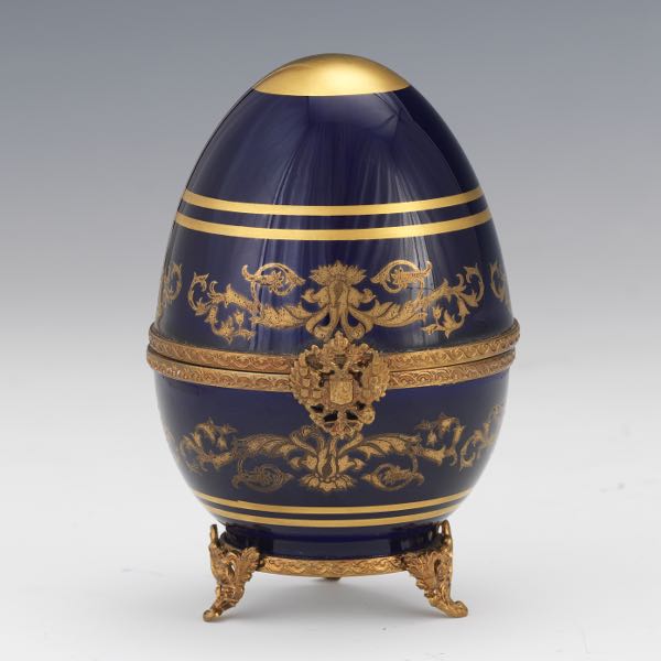 Appraisal: FABERG COLLECTION' PARCEL GILT STERLING SILVER AND PORCELAIN IMPERIAL EGG