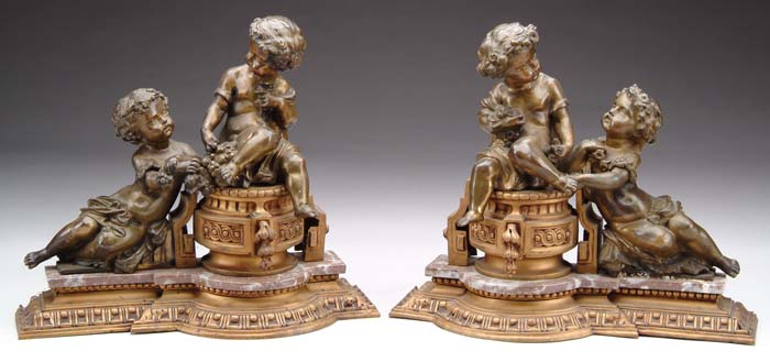 Appraisal: PAIR OF BRONZE AND MARBLE CHENETS The opposing pair have