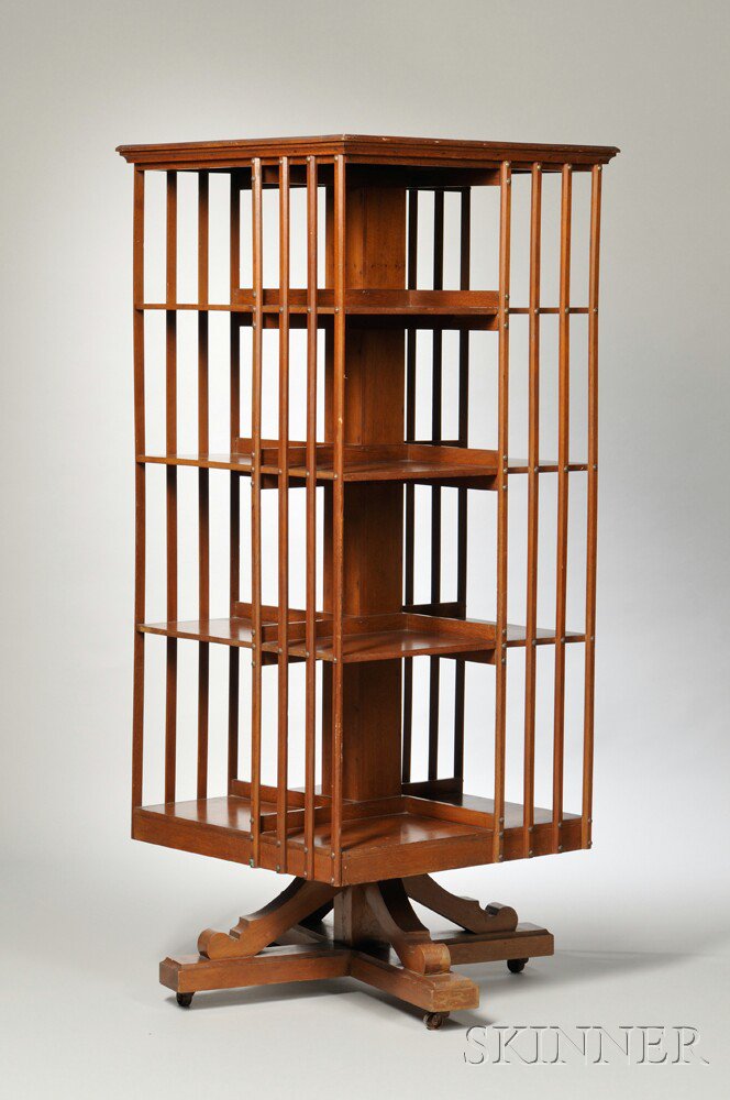 Appraisal: Walnut Four-tier Revolving Bookcase th century ht wd dp in