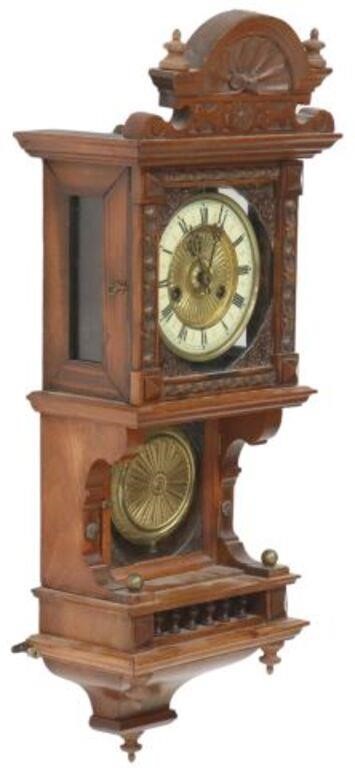 Appraisal: Carved wood wall clock late th early th c carved