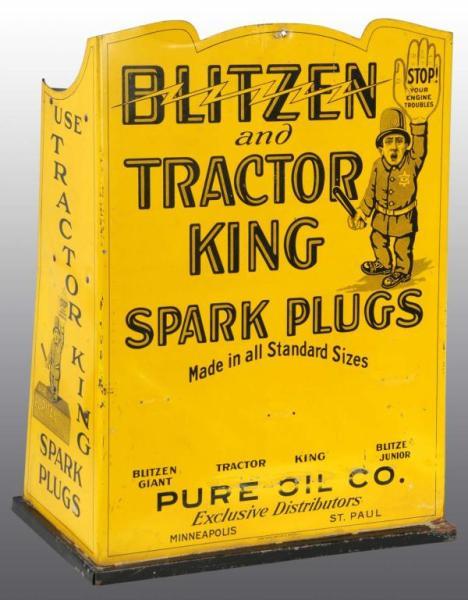 Appraisal: Tin Blitzen Tractor King Spark Plug Display Description Great countertop