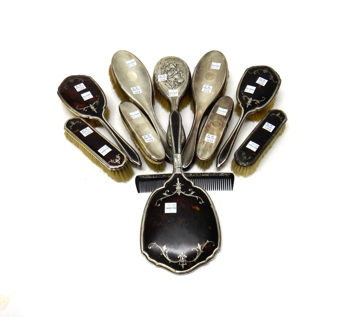 Appraisal: A lady's silver and tortoiseshell mounted five piece part dressing