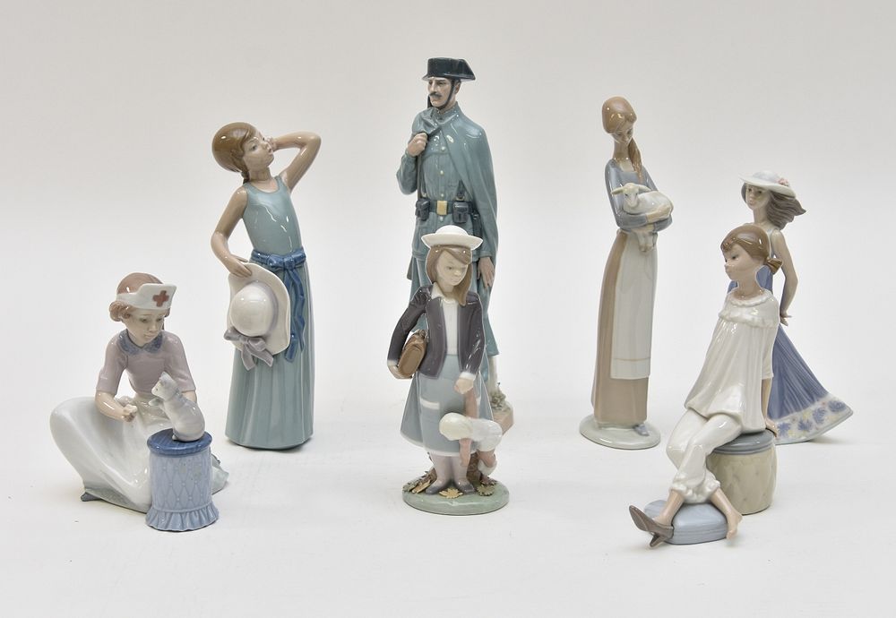 Appraisal: Seven Lladro Figures Seven Lladro figures including a soldier h