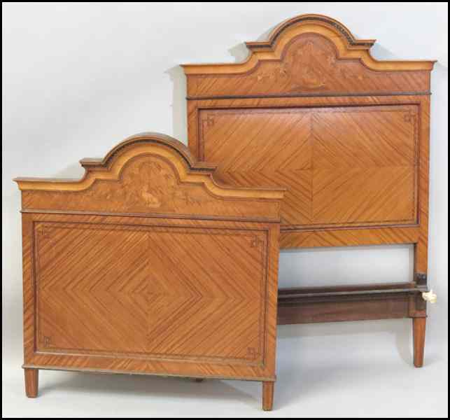 Appraisal: PAIR OF ENGLISH SATINWOOD BED FRAMES Comprised of two headboards