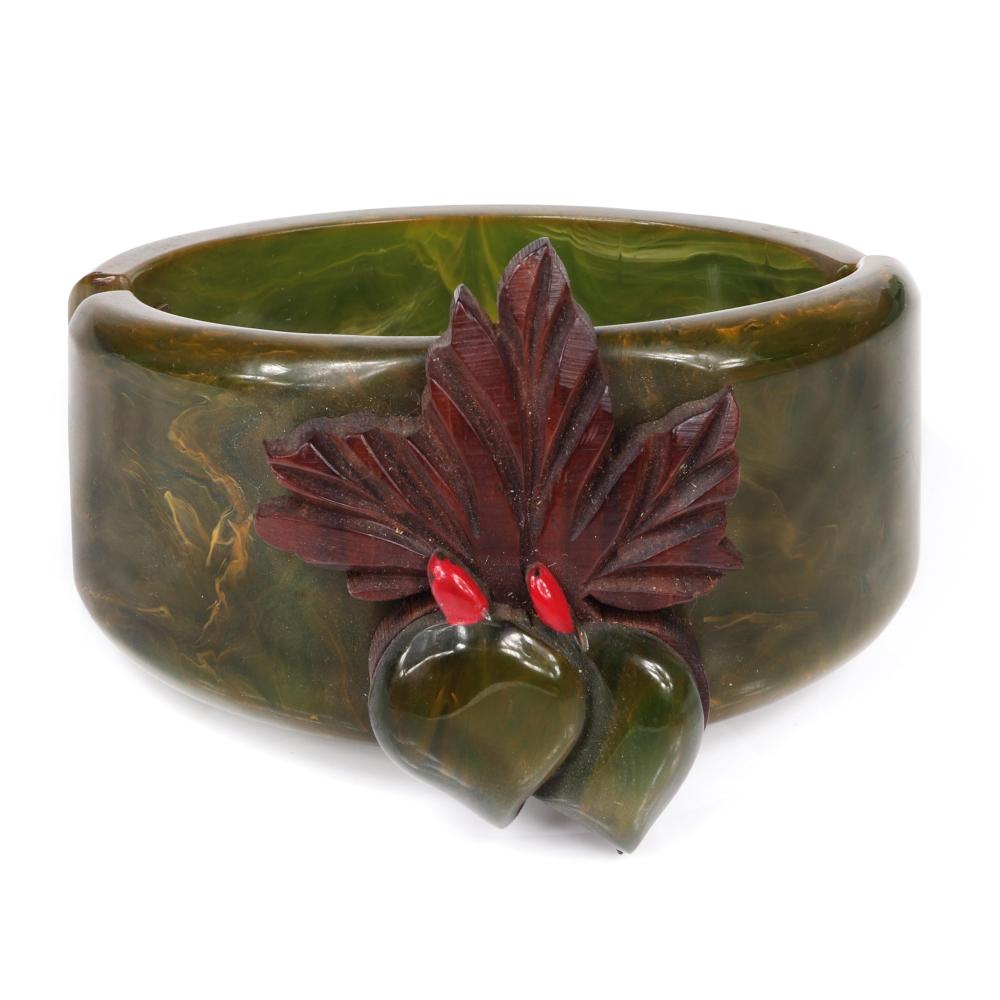 Appraisal: VINTAGE MARBLED CREAMED SPINACH BAKELITE WIDE VEGETABLE MOTIF CLAMPER CUFF