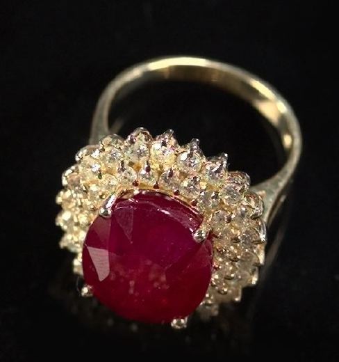 Appraisal: Fourteen-Karat Yellow Gold Ruby and Diamond Dinner Ring featuring a