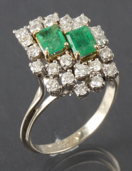 Appraisal: KW two mm x mm emerald cut emeralds round diamonds