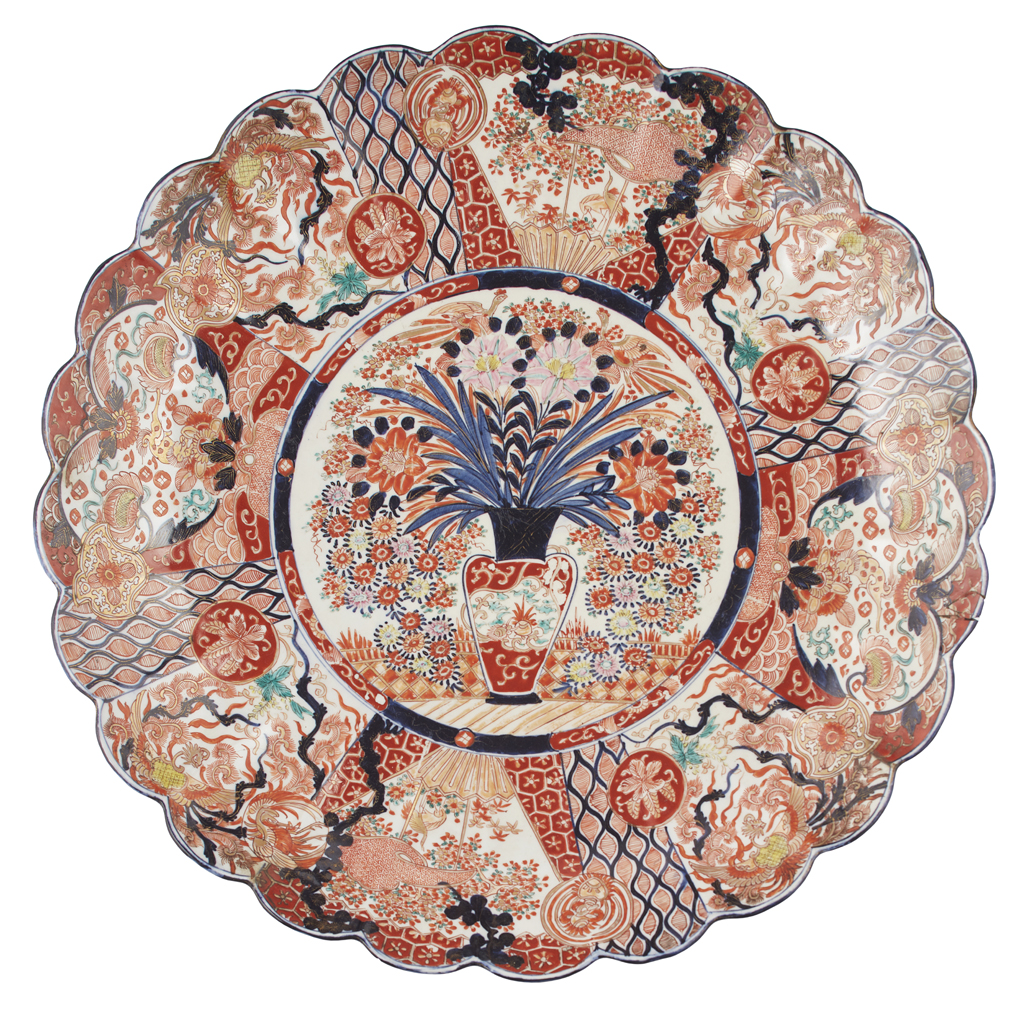 Appraisal: UNUSUALLY LARGE IMARI CHARGER MEIJI PERIOD painted with a large