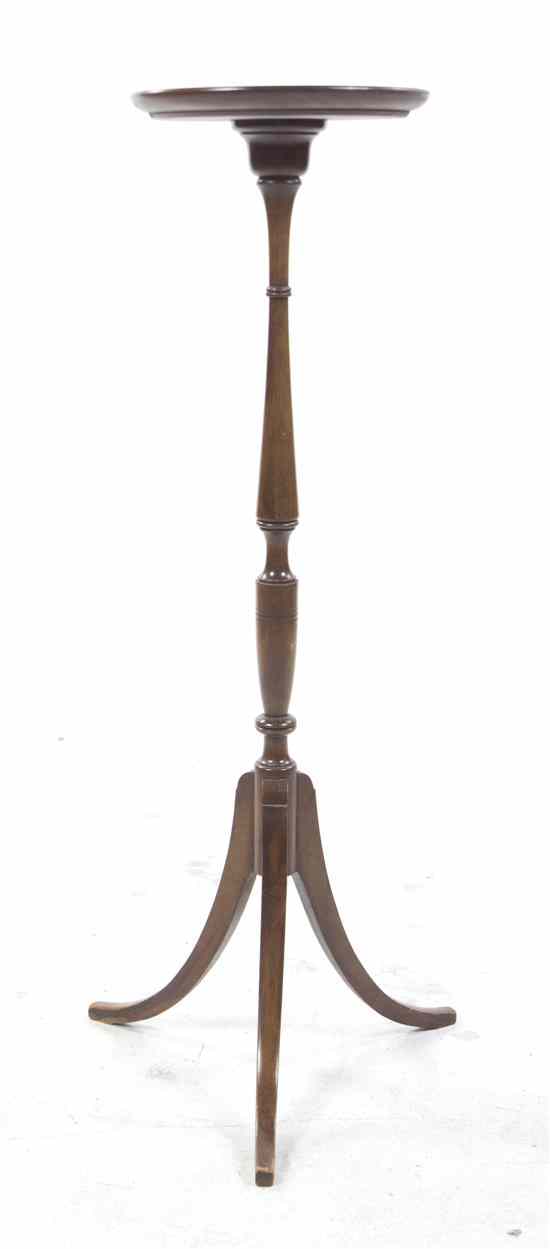 Appraisal: A Georgian Style Mahogany Pedestal having a circular top over