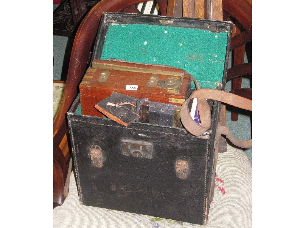 Appraisal: Vintage brass plate camera with tripod stand