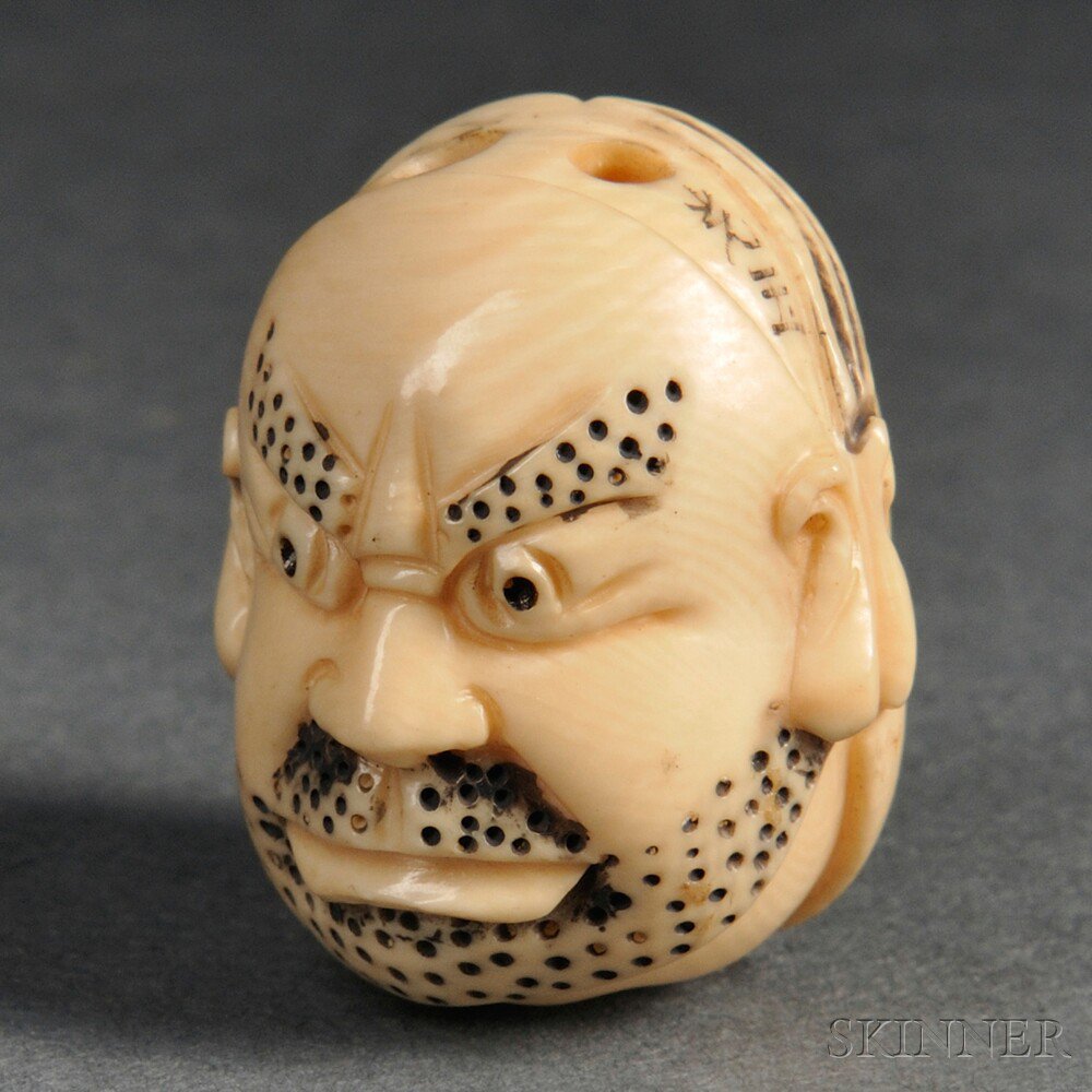 Appraisal: Ivory Netsuke with Three Faces Japan th th century including