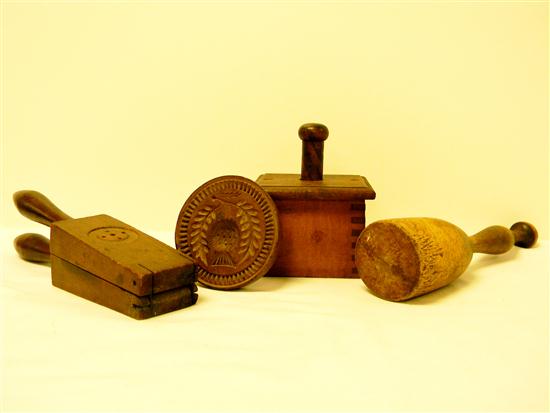 Appraisal: Woodenware two butter presses one missing handle a lemon press