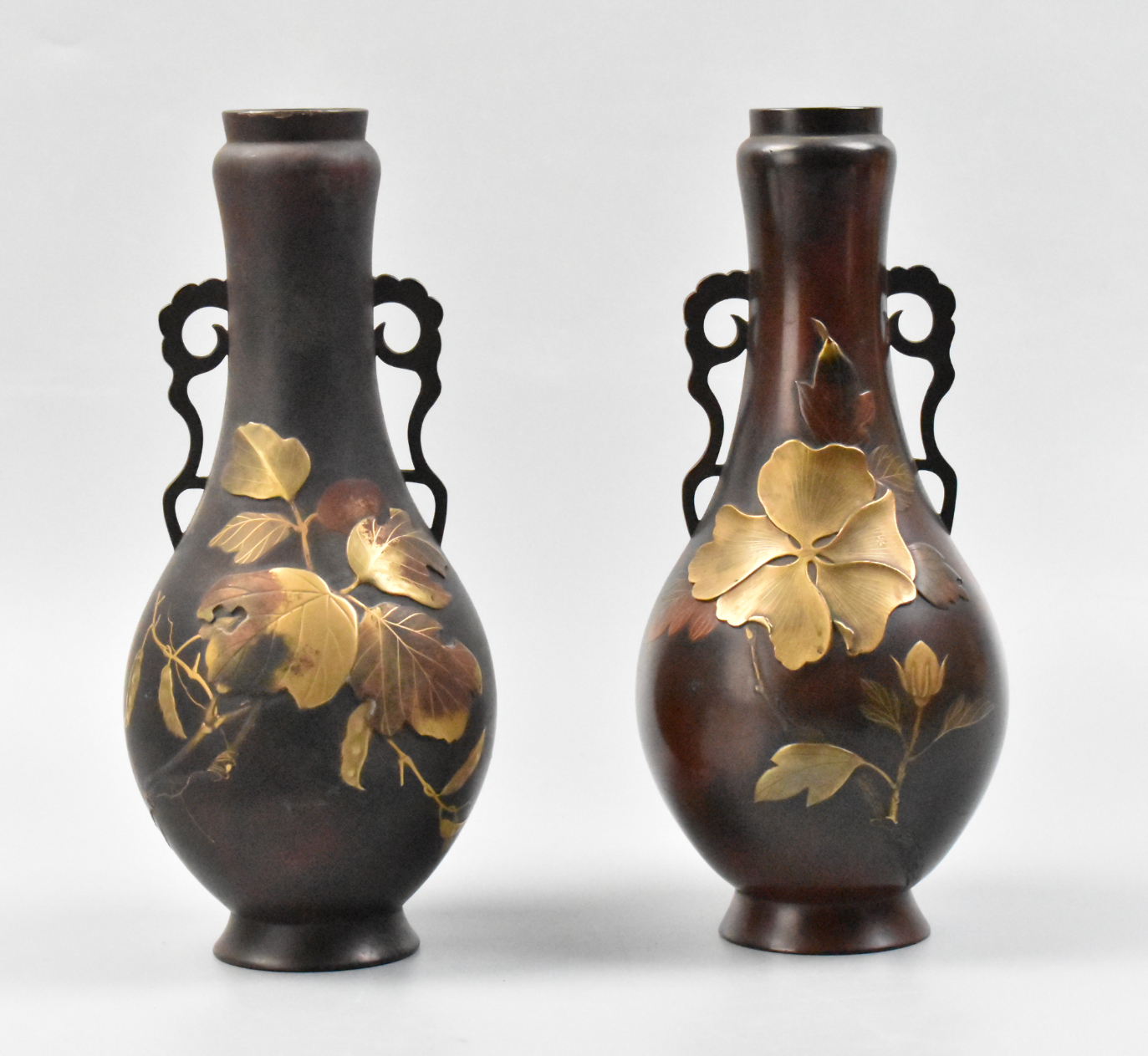 Appraisal: A pair of Japanese mix metal bronze vases with lacquer