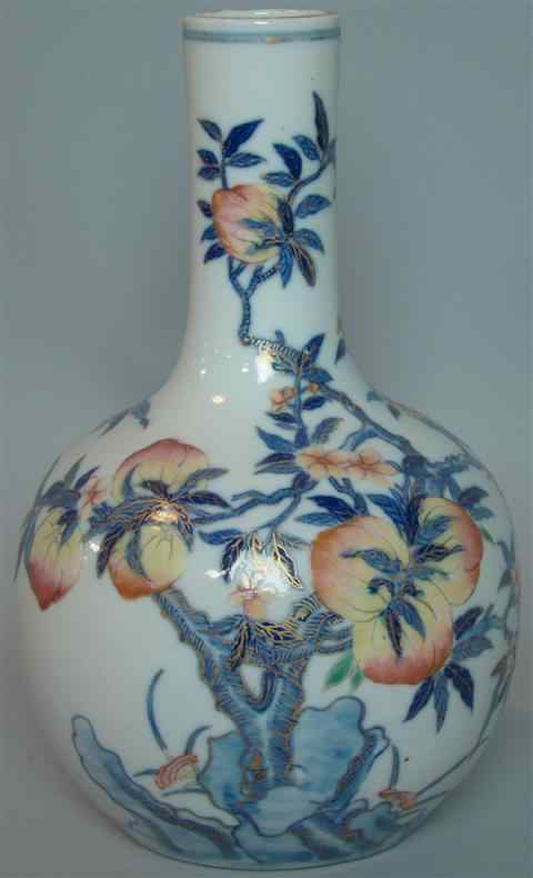 Appraisal: CHINESE UNDERGLAZE BLUE AND ENAMEL PEACH VASE six-character Qianlong seal