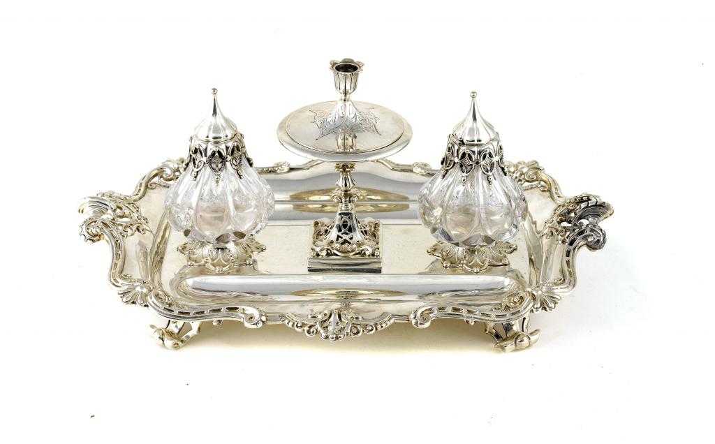 Appraisal: A VICTORIAN OBLONG INKSTAND of moulded design with pierced strapwork