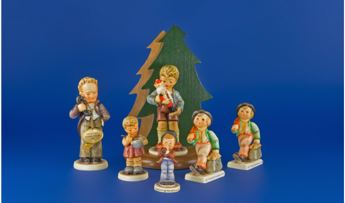 Appraisal: Collection of Six Hummel Figures Holiday figure Boy carrying bag