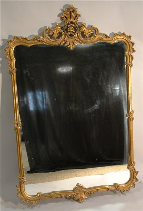 Appraisal: LOUIS XV STYLE GOLD PAINTED MIRROR the rectangular mirror with