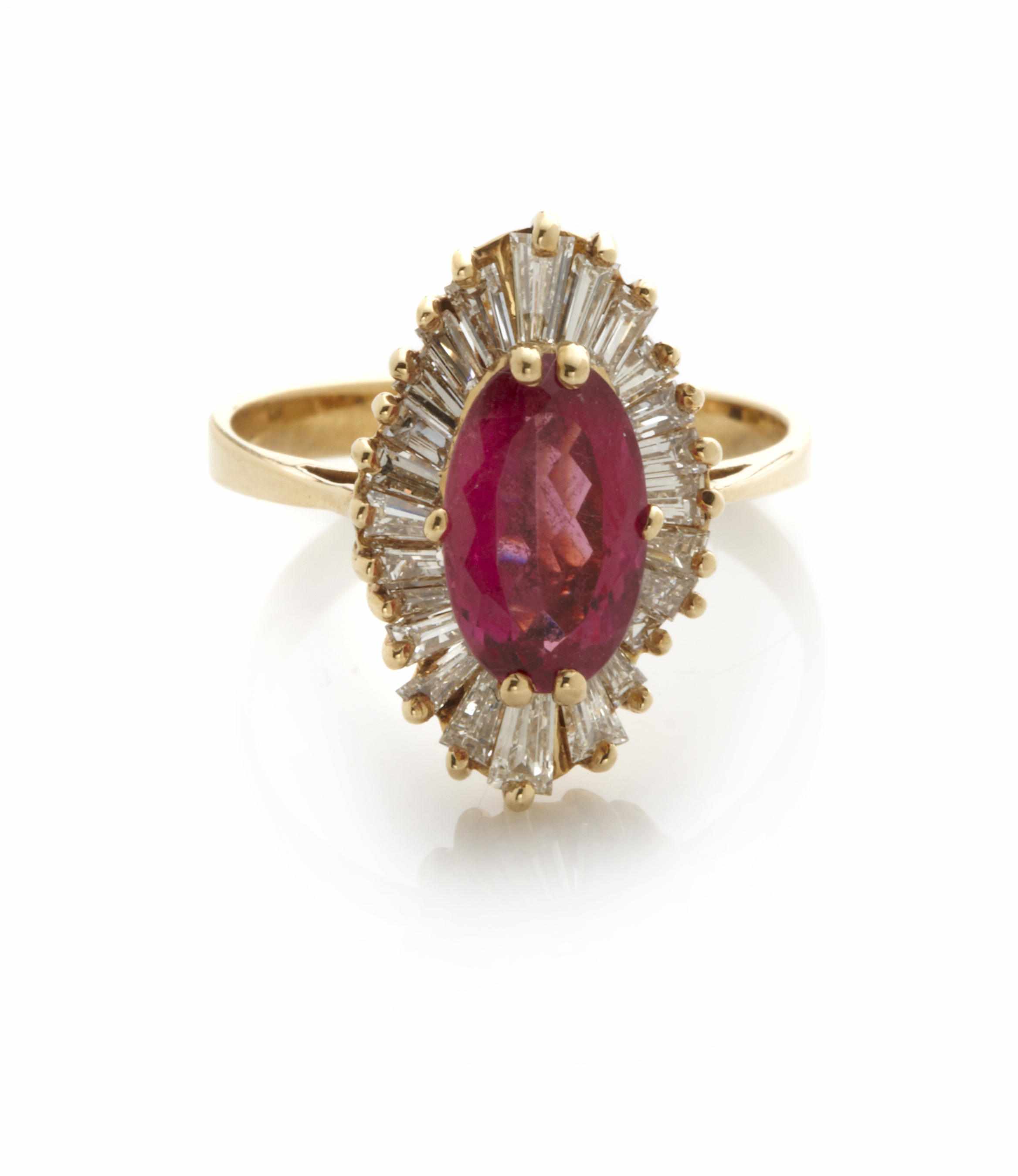 Appraisal: An oval-shaped rubelite diamond and k gold ring size