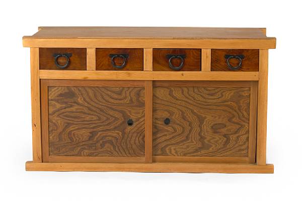 Appraisal: A Japanese mixed wood tansu chest height ft in width