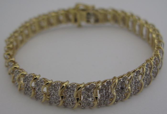 Appraisal: DIAMOND AND K GOLD BRACELET - in length and set