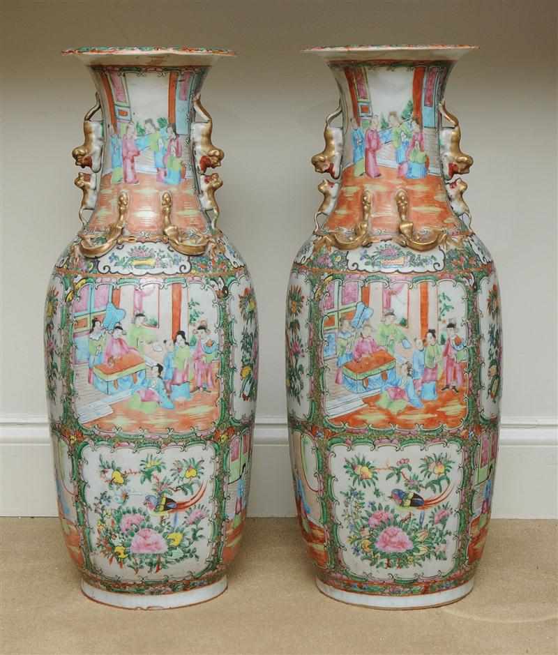 Appraisal: PAIR OF ROSE MEDALLION PORCELAIN BALUSTER-SHAPED VASES Fitted with fu