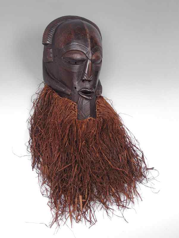 Appraisal: AFRICAN CARVED GRASS BEARDED MASK Approx '' x '' excluding