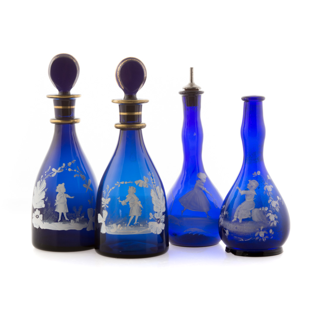 Appraisal: Four Mary Gregory cobalt glass articles including pair of decanters