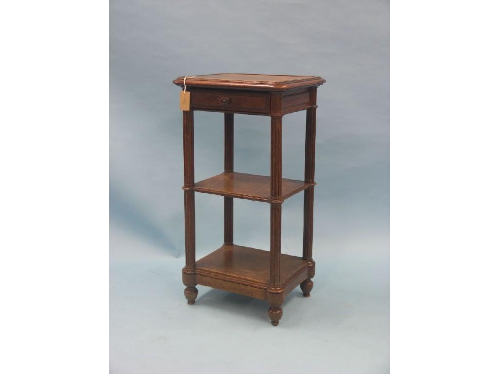 Appraisal: A th century oak three-tiered table rectangular top above single