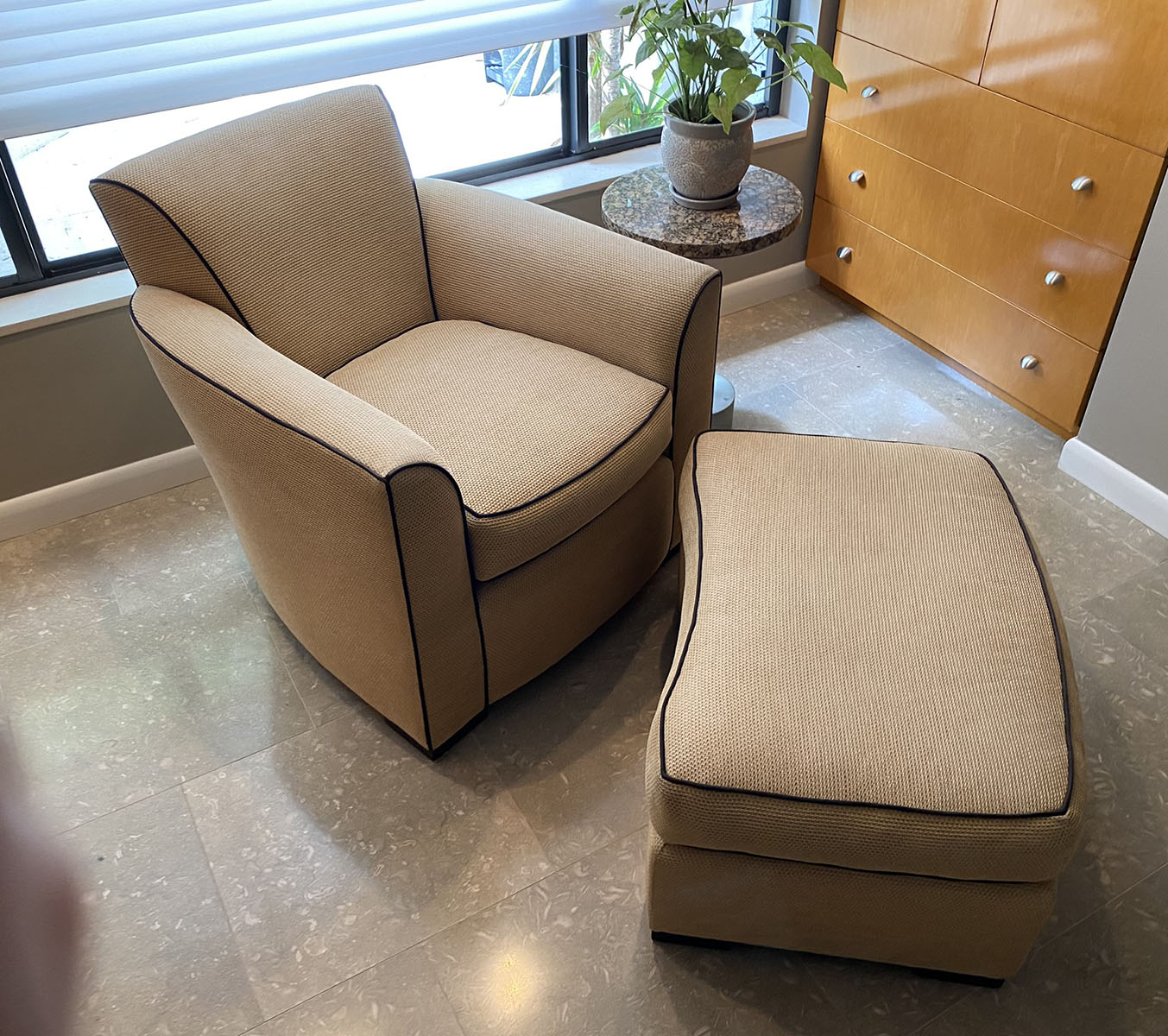 Appraisal: SUPER COMFY PIECE DONGHIA CHAIR AND OTTOMAN Upholstered creme soft