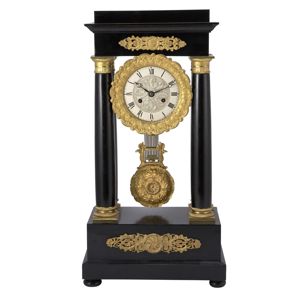 Appraisal: Empire Gilt-Bronze Mounted Ebonized Portico Clock First quarter of the