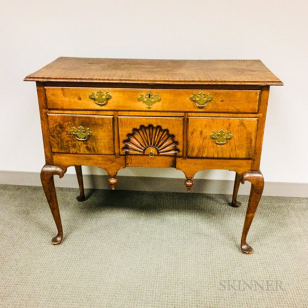 Appraisal: Queen Anne Shell-carved Tiger Maple High Chest Base Queen Anne