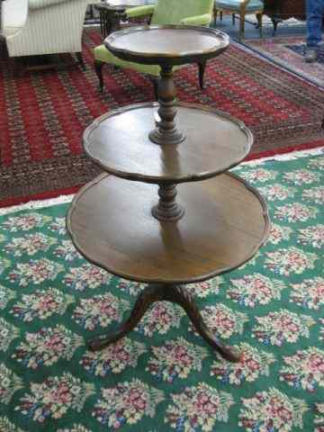 Appraisal: Mahogany Triple Tier Server orbutler stand pie crust design ''