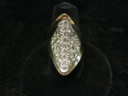 Appraisal: karat yellow gold and diamond cluster ringDiamond shaped and raised