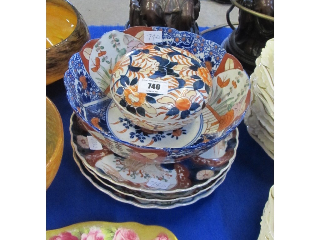 Appraisal: Three Imari plates bowl and a box and cover