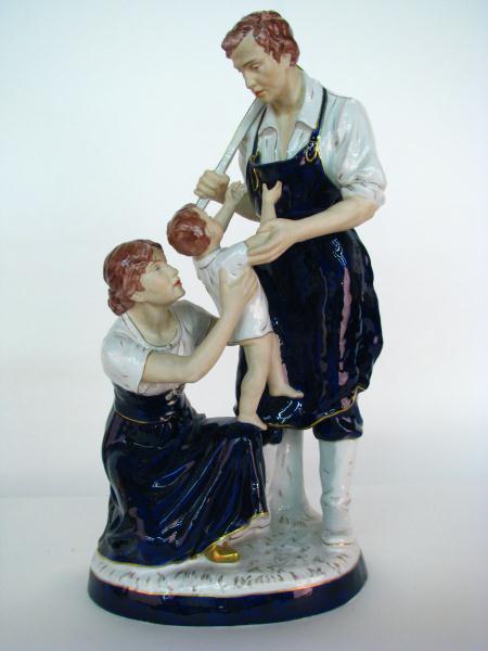 Appraisal: Royal Dux porcelain figure of a blacksmith and family ''