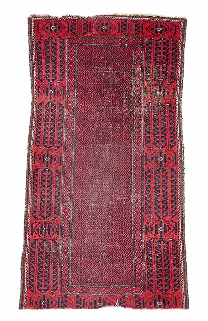 Appraisal: AN AFGHAN BRICK GROUND RUG with four central octagons in