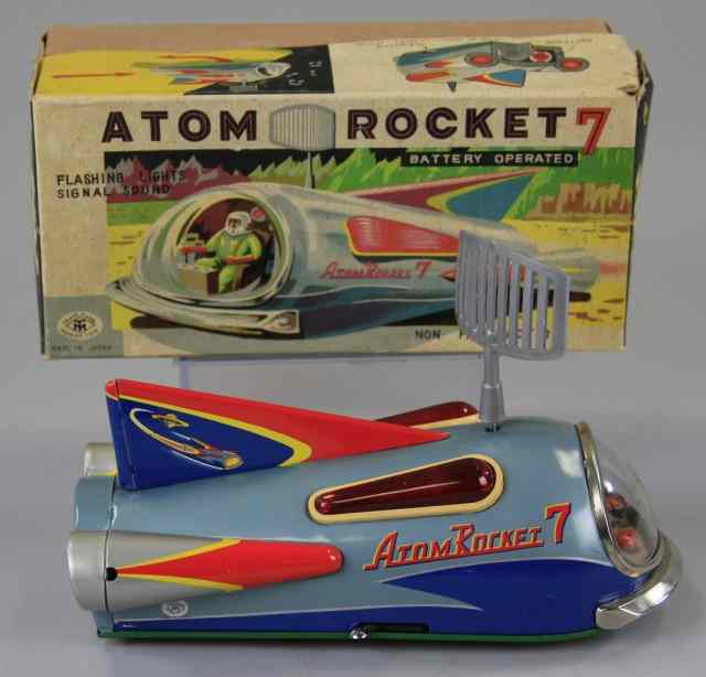 Appraisal: BOXED ATOM ROCKET Modern Toys Japan lithographed tin battery operated