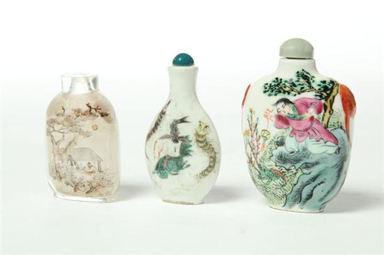 Appraisal: THREE SNUFF BOTTLES China th century Two are porcelain one