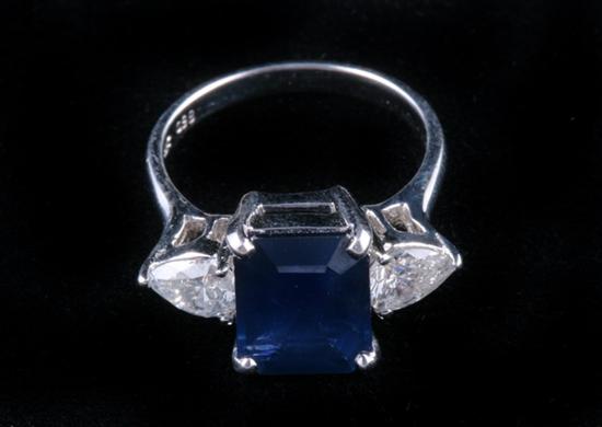 Appraisal: K WHITE GOLD DIAMOND AND SAPPHIRE RING Emerald-cut sapphire weighing