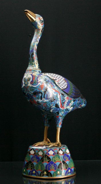 Appraisal: A Chinese cloisonn duck on a raised base cms high