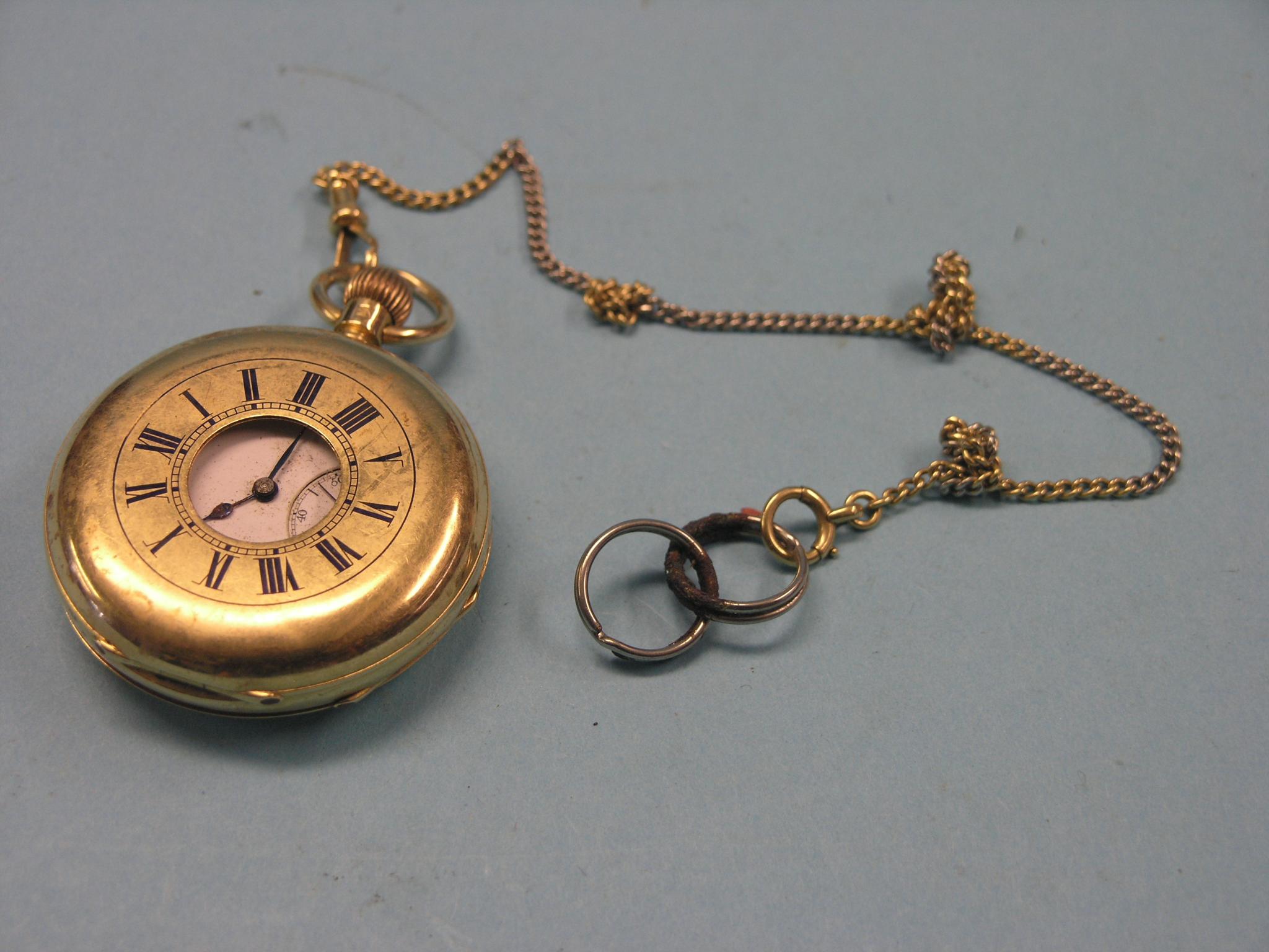 Appraisal: An ct gold half-hunter pocket watch enamelled dial with subsidiary