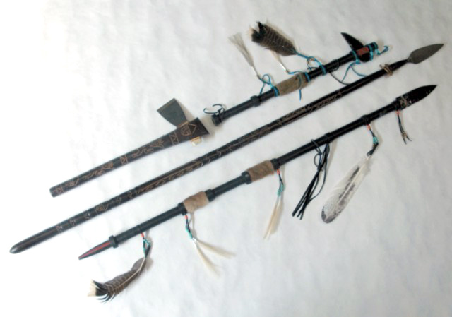 Appraisal: LOT OF FOUR DECORATIVE INDIAN STYLE WEAPONS two are leather