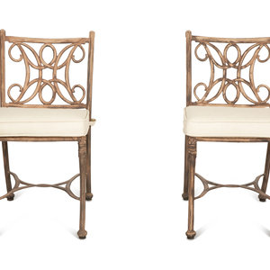 Appraisal: A Pair of Patinated Metal Garden Chairs and Side Table