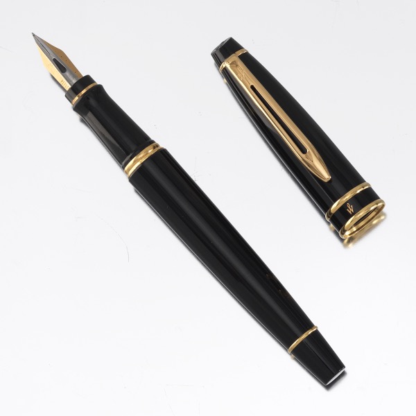 Appraisal: WATERMAN FOUNTAIN PEN Black with gold-tone trim fine nib converter