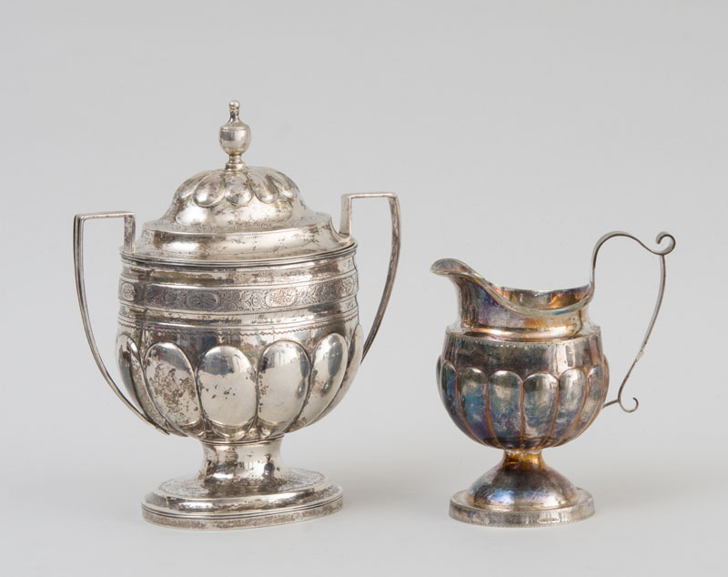 Appraisal: AMERICAN SILVER SUGAR BOWL AND COVER AND A CREAMWARE JUG