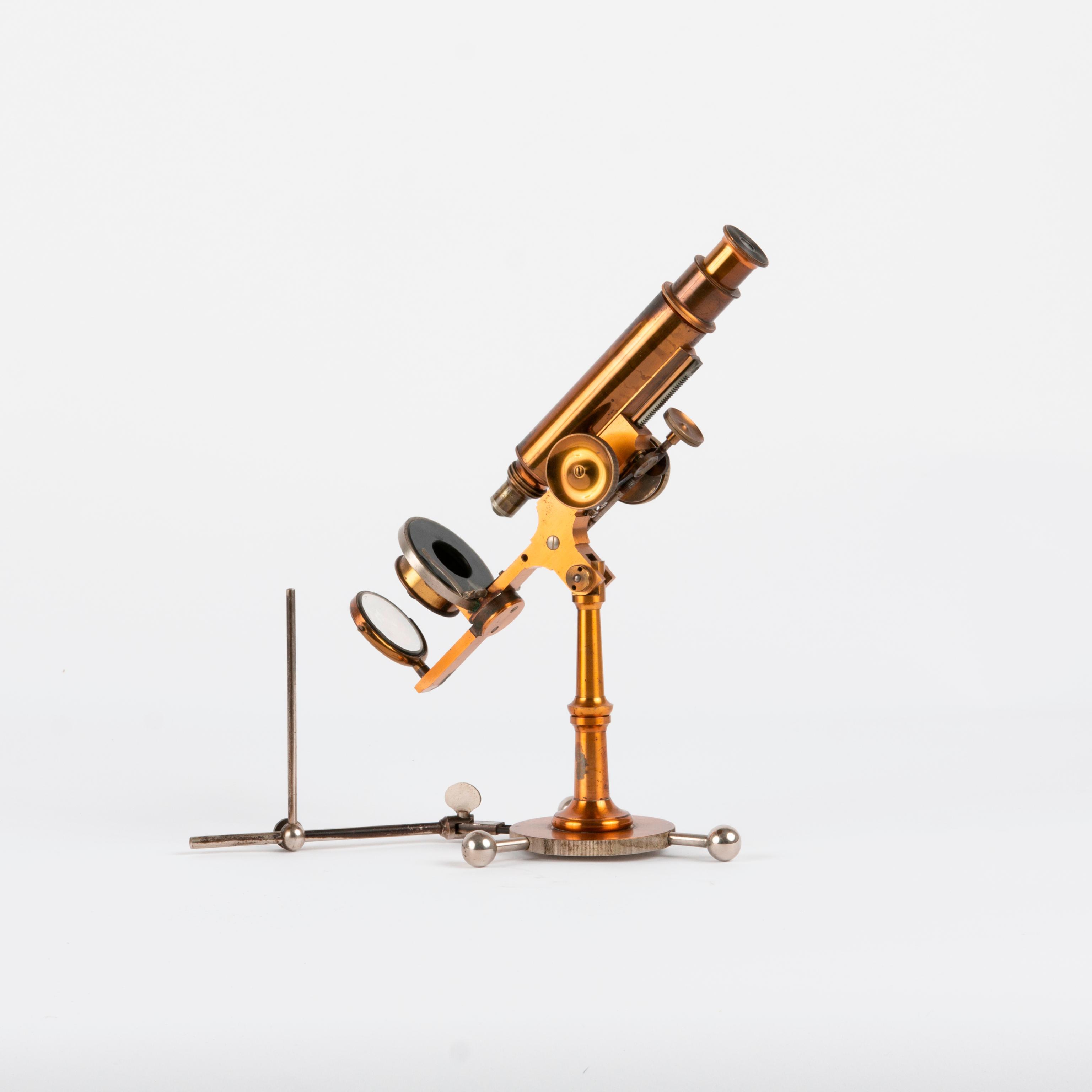 Appraisal: GRIFFITH CLUB MICROSCOPE WITH BURNER CIRCA - A rare Improved