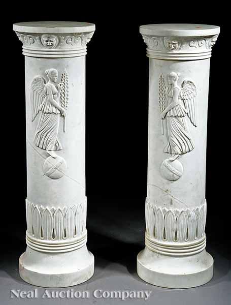 Appraisal: A Pair of Neoclassical-Style Carved Carrara Marble Pedestals round top